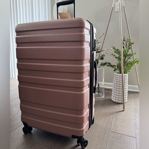 New! Calpak 25” Hardside Spinner Luggage in Rose Gold